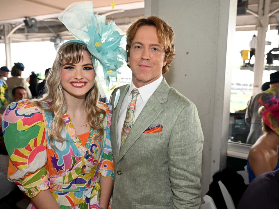 Anna Nicole Smith's daughter Dannielynn Birkhead and Larry Birkhead attend the 148th Kentucky Derby at Churchill Downs on May 07, 2022 in Louisville, Kentucky.