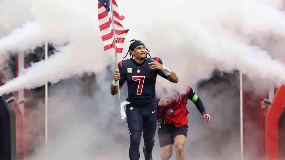 Stroud runs out onto the field ahead of the Texans' game against the Arizona Cardinals. - Tim Warner/Getty Images