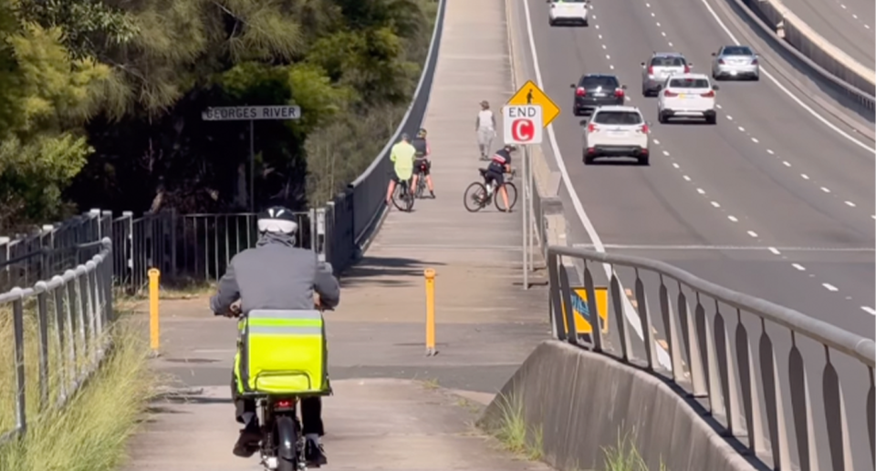 The Alfords Point Bridge in Sydney's South. Bicycle riders are pictured. 