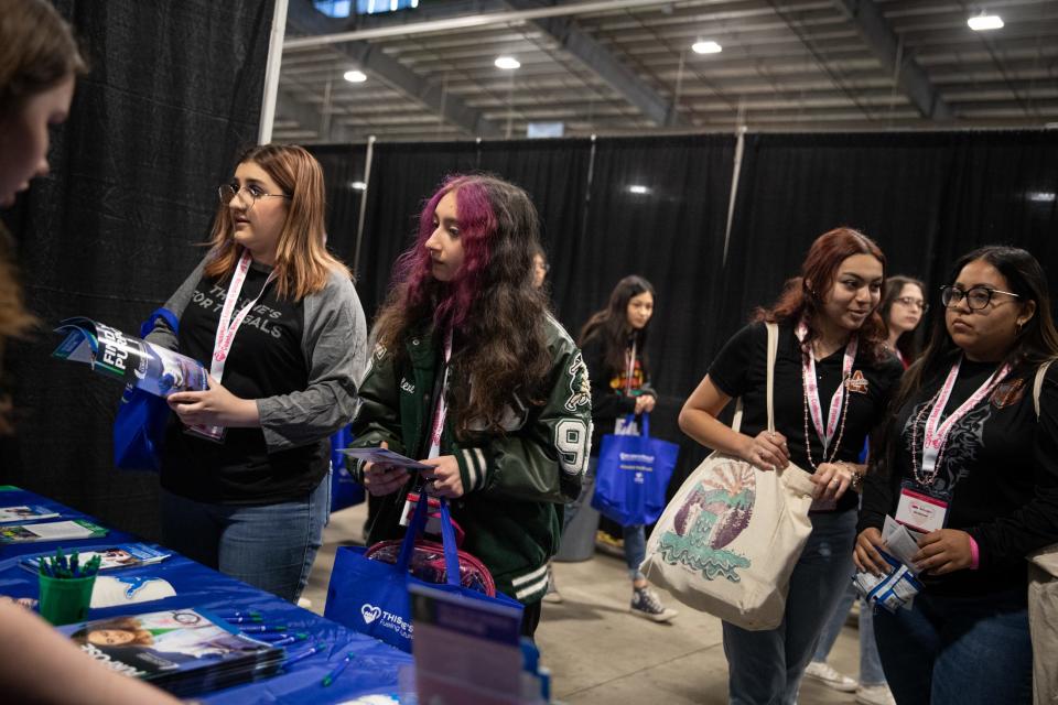 From left, King juniors Karlene Cascio, Kaitlyn Colton, and Alice juniors Rebecca Gonzalez and Valeria Gonzalez visit a Texas A&M- Corpus Christi business school booth during the Coastal Bend Women in Industry Conference on Thursday, April 11, 2024, in Robstown, Texas.