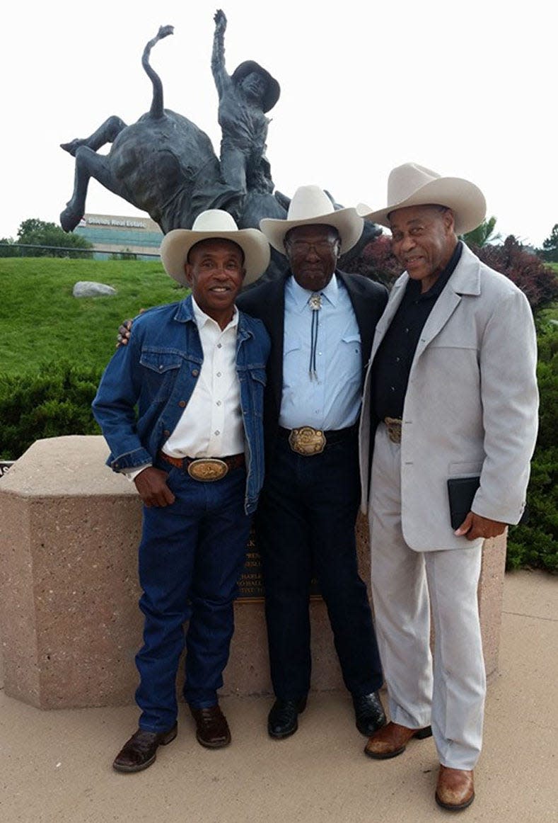 Charles Sampson (left), Myrtis Dightman and Jesse "Charlie Reno" Hall in 2016 when Dightman was inducted into the Pro Rodeo Hall of Fame.