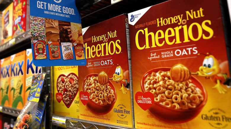 Shelved boxes of honey nut cheerios
