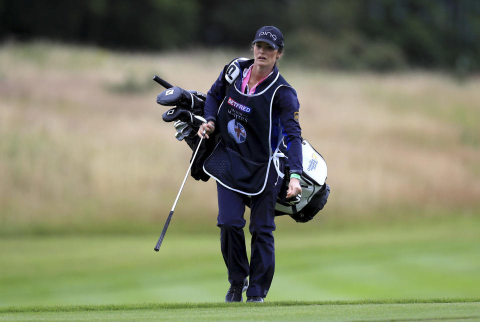 Lee Westwood's girlfriend and caddie, Helen Storey during day one of the British Masters at Close House Golf Club, near Newcastle, England, Wednesday July 22, 2020. The European Tour resumes in earnest after its pandemic-induced shutdown with the British Masters starting Wednesday. (Mike Egerton/PA via AP)