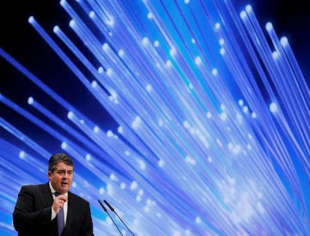 German Economy Minister and leader of the Social Democratic Party (SPD) Sigmar Gabriel makes his keynote speech during the SPD party congress in Berlin, Germany, December 11, 2015. REUTERS/Fabrizio Bensch/Files