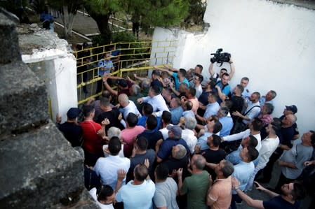 Opposition supporters demonstrate during an anti-government protest in Kavaja