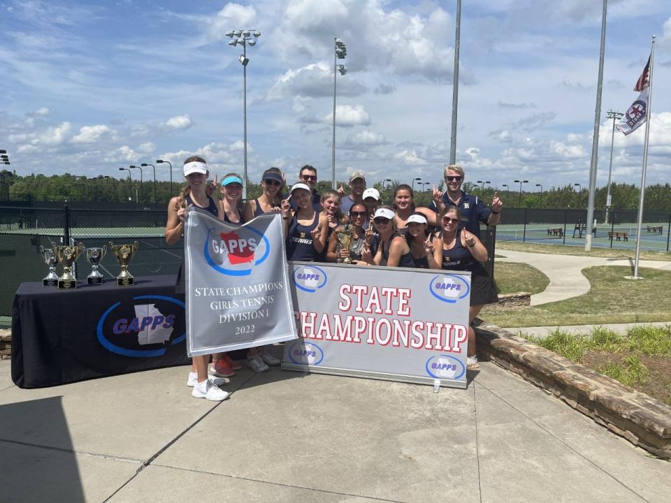 The Habersham School girls tennis team poses with its state championship trophy.