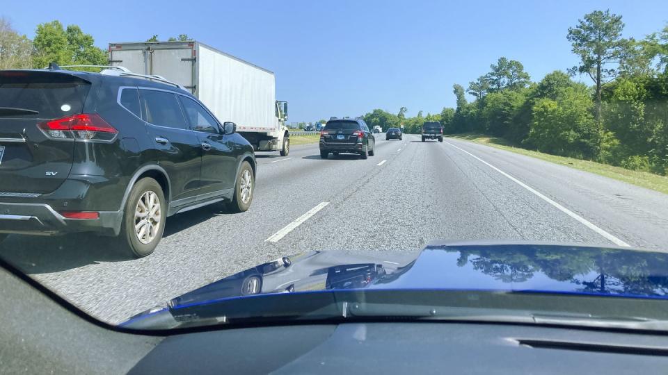 a group of cars on a road