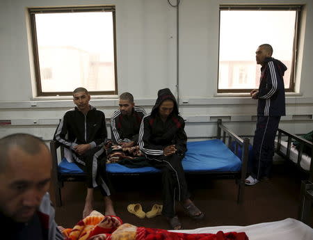 Drug addicts sits on their beds at a newly-opened treatment centre at Camp Phoenix, in Kabul, Afghanistan January 3, 2016. REUTERS/Ahmad Masood
