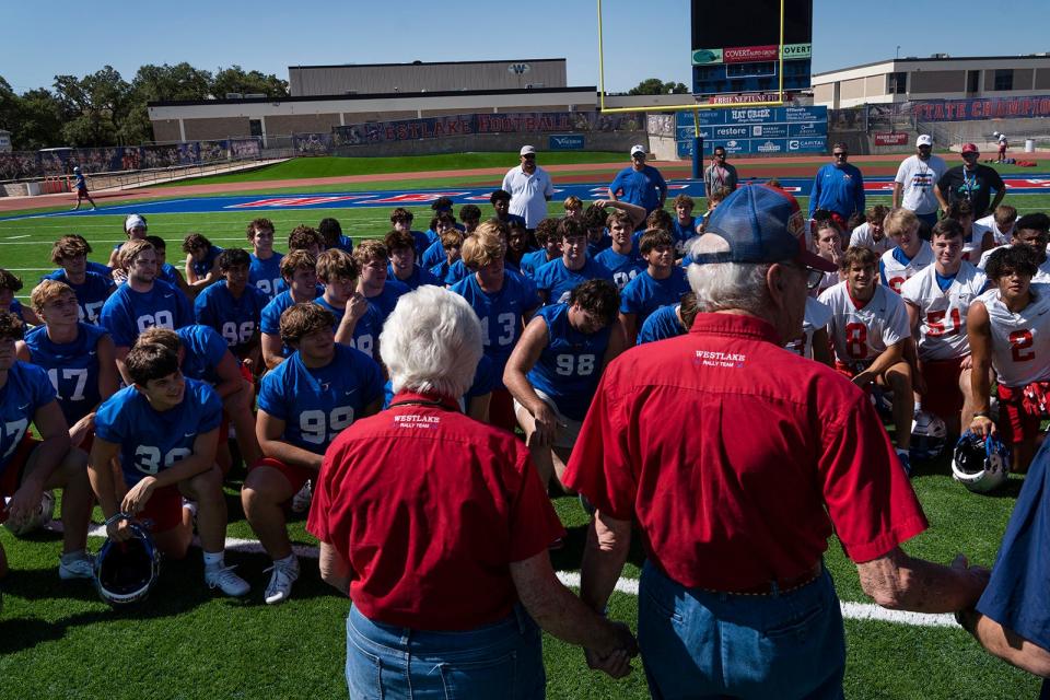 Jim and Alice Niven are introduced to the Westlake football team Thursday. They have been season ticket holders since 1969. "Football was a part of life," said Teri Waters, their daughter. "I don't remember a time when I didn't go to games."
