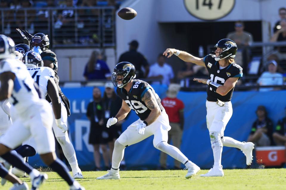 Jacksonville Jaguars quarterback Trevor Lawrence (16) reached two milestones when he connected on a 14-yard third quarter pass to Luke Farrell, becoming the fourth QB in team history to reach 10,000 passing yards and the third-youngest in NFL history to hit that plateau.