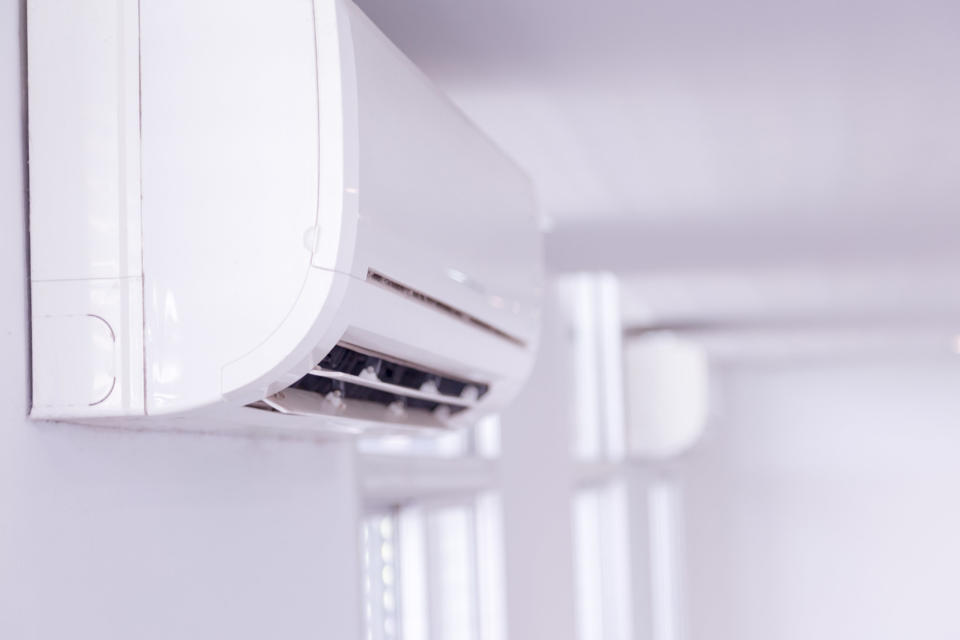 An air conditioning cassette on a wall.