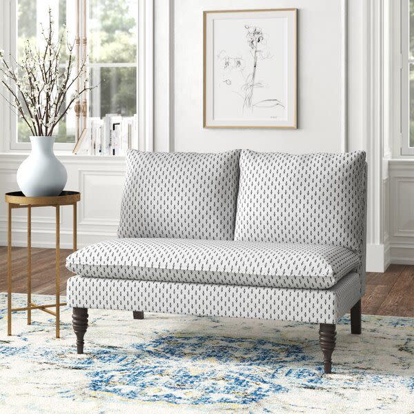 6) Sidney Cotton Armless Settee