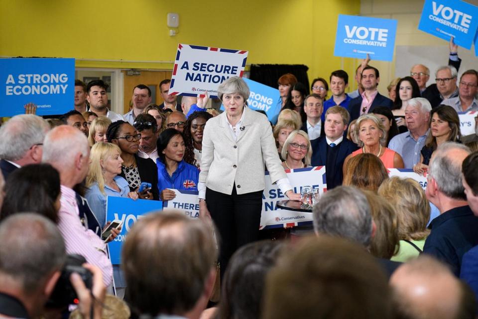 Theresa May addresses voters in Twickenham (REUTERS)