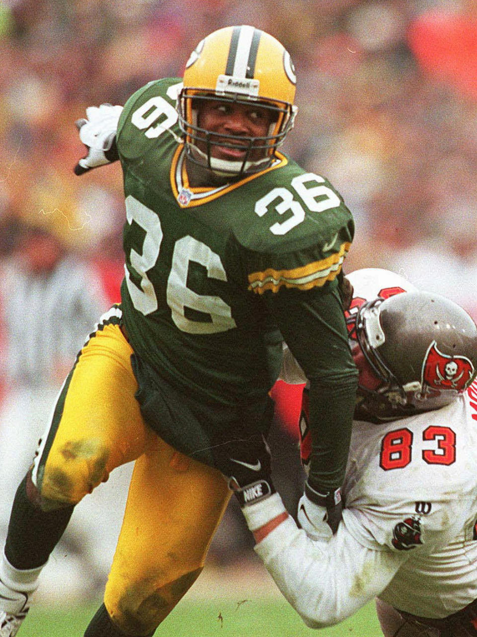 FILE - In this Jan. 4, 1998 file photo, Green Bay Packers strong safety LeRoy Butler moves in against the Tampa Bay Buccaneers during the NFC Divisional Playoffs in Green Bay, Wis. Butler was selected as a finalist for the Pro Football Hall of Fame's class of 2021 on Tuesday, Jan. 5, 2021 (.AP Photo/Charles Krupa, File)