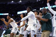 Michigan State players cheer during the second half against Davidson in a college basketball game in the first round of the NCAA men's tournament Friday, March 18, 2022, in Greenville, S.C. (AP Photo/Brynn Anderson)