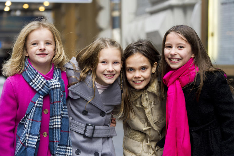 Actresses from left, Milly Shapiro, Sophia Gennusa, Oona Laurence and Bailey Ryon, who will share the title role in "Matilda the Musical" on Broadway, pose for a portrait outside the Shubert Theatre, on Thursday, Nov. 15, 2012 in New York. (Photo by Charles Sykes/Invision/AP)