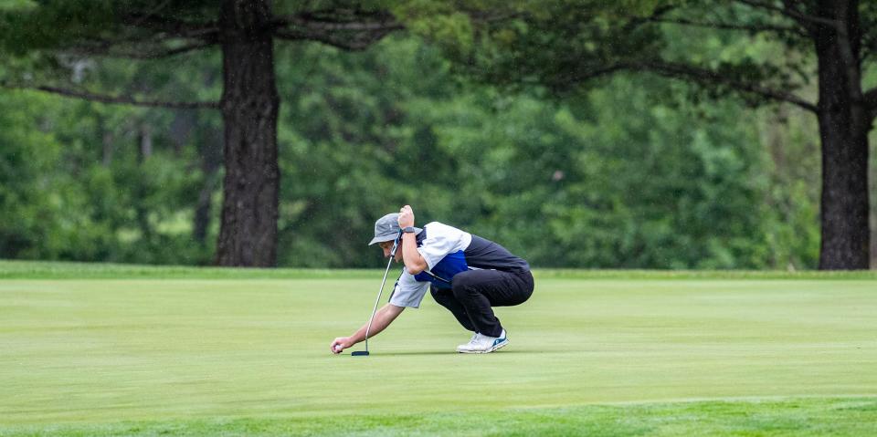 Danny Gorman lines up his put on Saturday, June 4, 2022, at Ledges Golf Course in Roscoe.