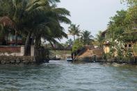 <p><b>Entrance to Calvathy Canal from the harbour</b><br><em>©Donald Fels / Published in ‘Mosques of Cochin’ by Patricia Tusa Fels</em> <br>The bridge across the Calvathy canal separated Fort Cochin, which was under British control, from the native ruler’s domain. Just past the canal, in what was the European preserve, sits the Calvathy Mosque. The mosque and the nearby canal are the meeting point between the historic European compound of Fort Cochin and the ‘native’ city.</p>