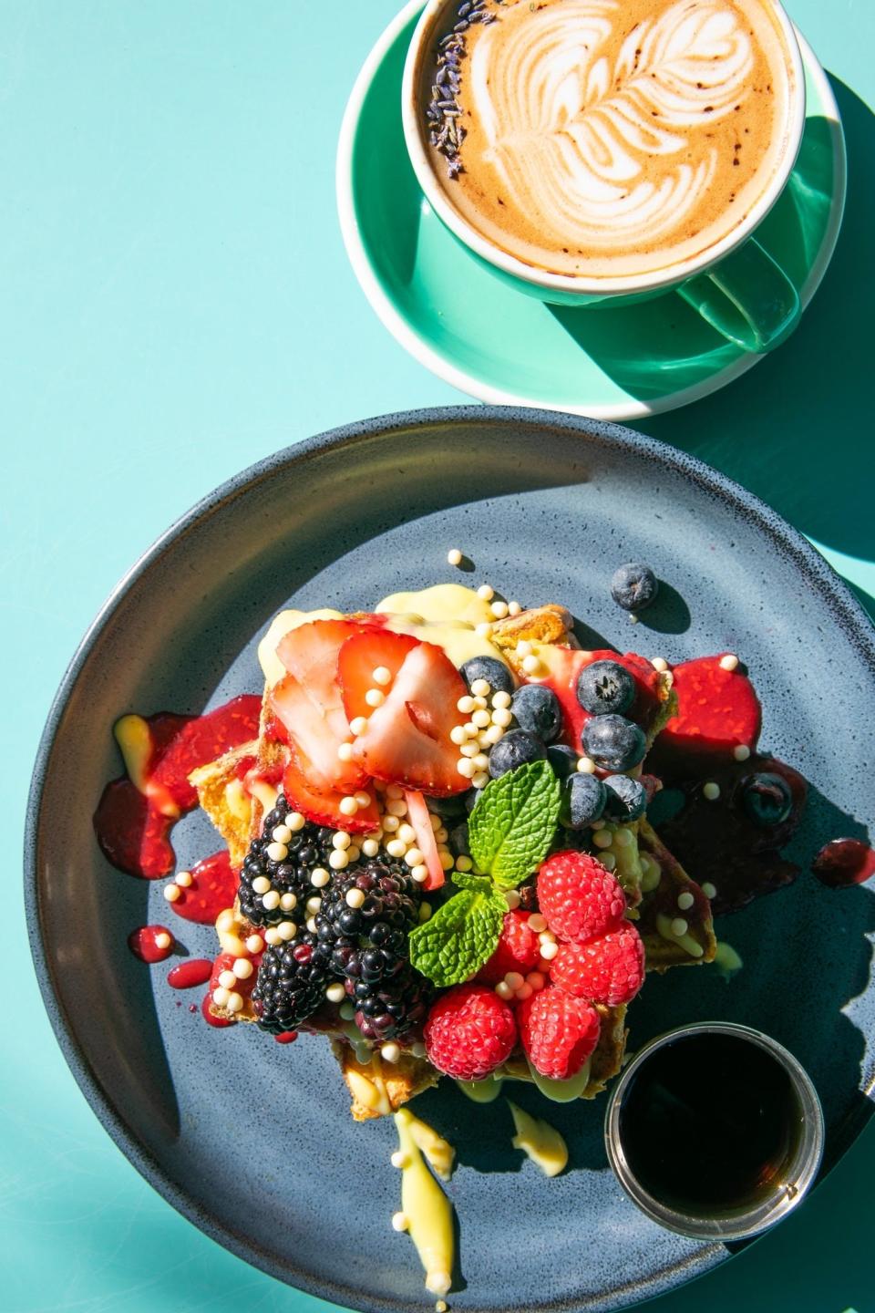 FILE - Several bright and colorful brunch dishes with specialty coffees are available at Collins Quarter in Savannah. The eatery was recently named one of Yelp's Top 100 Brunch Spots in the U.S.