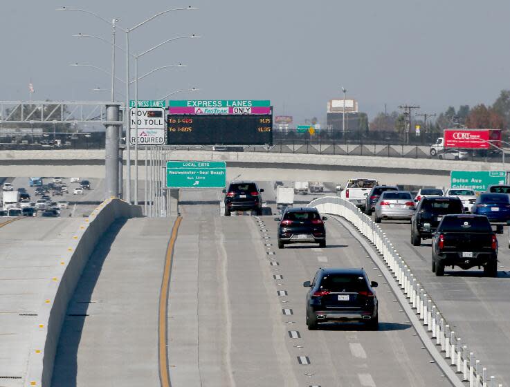 Huntington Beach, CA - FasTrak express lanes are open on the San Diego (405) Freeway from Costa Mesa to the San Gabriel River (605) Freeway on Friday, Dec. 1, 2023. The $2.16 billion project, which began in 2018, added one new lane in each direction as well as express lanes between state Route 73 and the San Gabriel River Freeway. (Luis Sinco / Los Angeles Times)