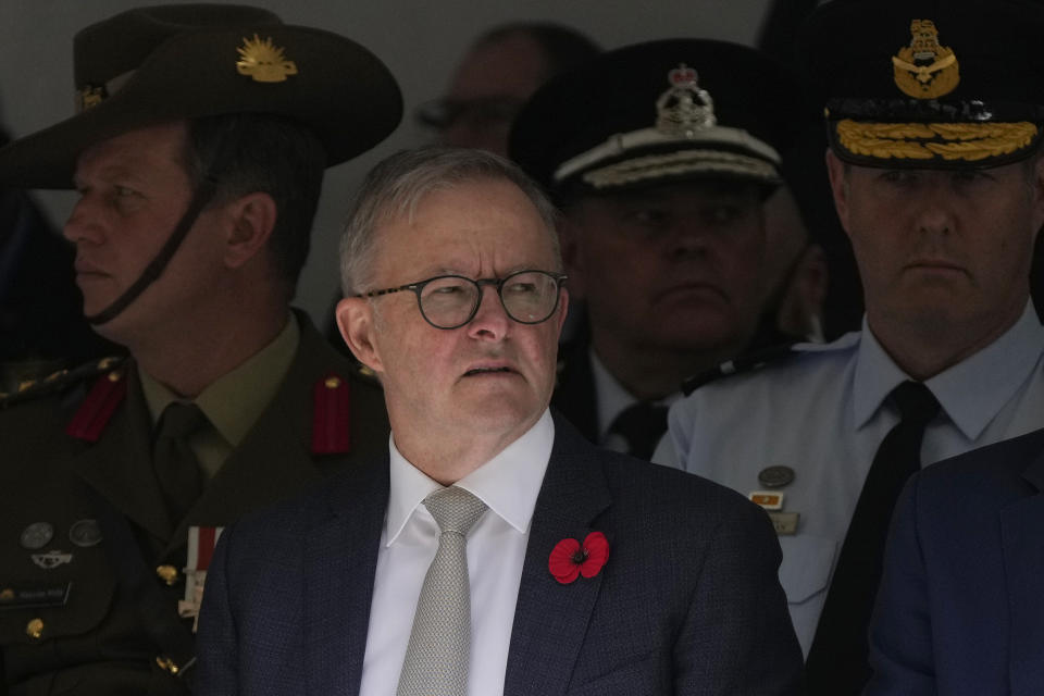 Australian Prime Minister Anthony Albanese attends Remembrance Day ceremonies in Sydney, Friday, Nov. 11, 2022. Albanese has said he'd ask Chinese President Xi Jinping to lift billions of dollars in trade barriers if the two leaders hold their first bilateral meeting this month.(AP Photo/Rick Rycroft)