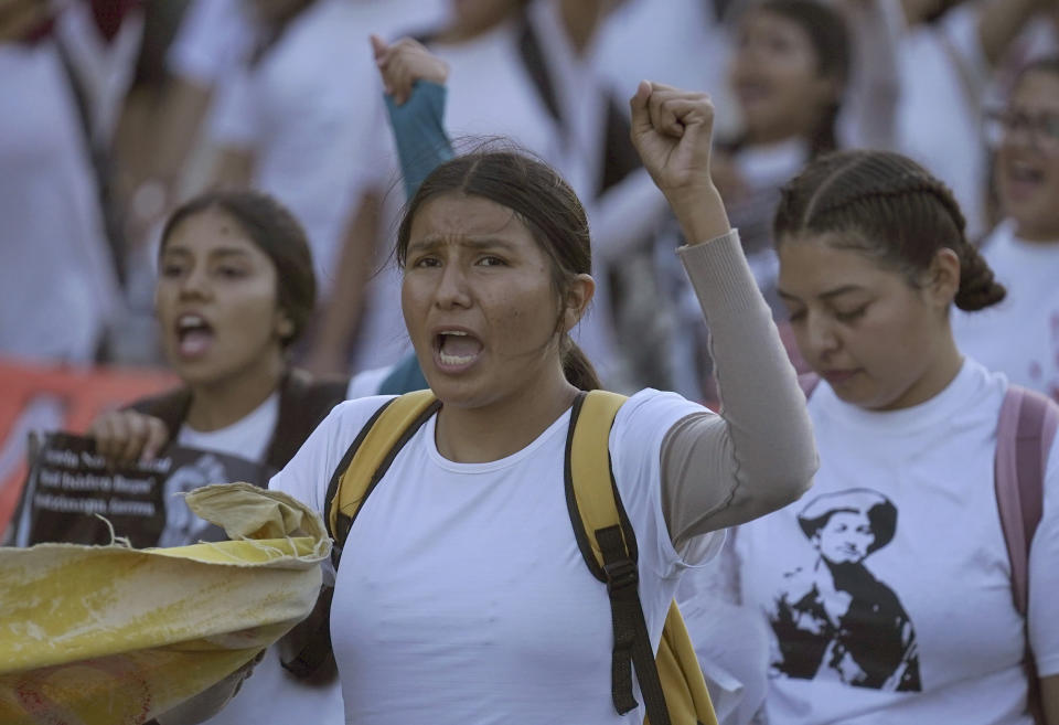 Relatives and sympathizers of 43 missing Ayotzinapa university students march on the 9th anniversary of their disappearance, in Mexico City, Tuesday, Sept. 26, 2023. (AP Photo/Marco Ugarte)