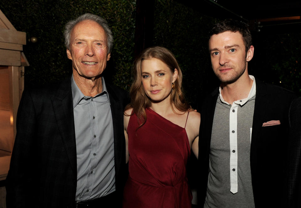 LOS ANGELES, CA - SEPTEMBER 19: (L-R) Producer/actor Clint Eastwood, actress Amy Adams and actor Justin Timberlake pose at the after party for the premiere of Warner Bros. Pictures' "Trouble with the Curve" at the Village Theater on September 19, 2012 in Los Angeles, California. (Photo by Kevin Winter/Getty Images)