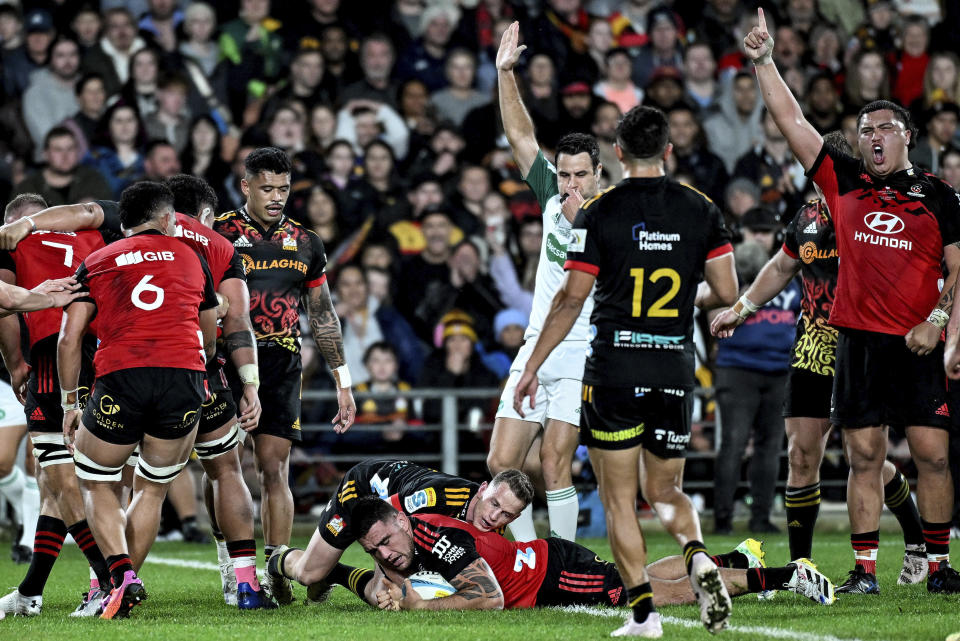 Referee Ben O'Keeffe signals a try for Codie Taylor of the Crusaders during the Super Rugby Pacific final between the Chiefs and the Crusaders in Hamilton, New Zealand, Saturday, June 24, 2023. (Andrew Cornaga/Photosport via AP)