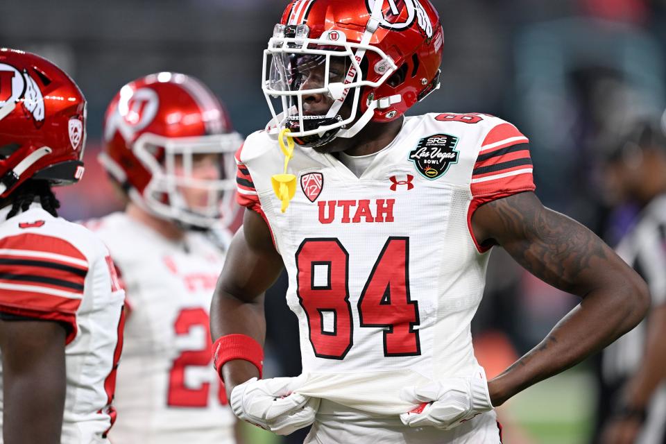 Utah Utes Sidney Mbanasor and other players gets ready as Utah and Northwestern prepare to play in the SRS Distribution Las Vegas Bowl on Saturday, Dec. 23, 2023. | Scott G Winterton, Deseret News