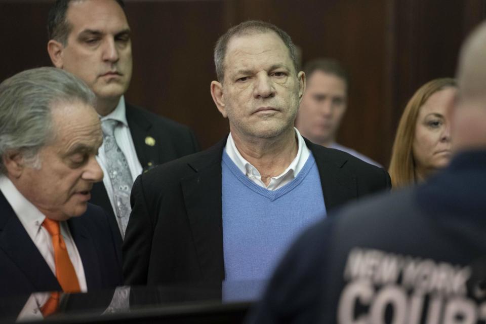 Harvey Weinstein charged with rape over attacks on two women after handing himself in to New York authorities