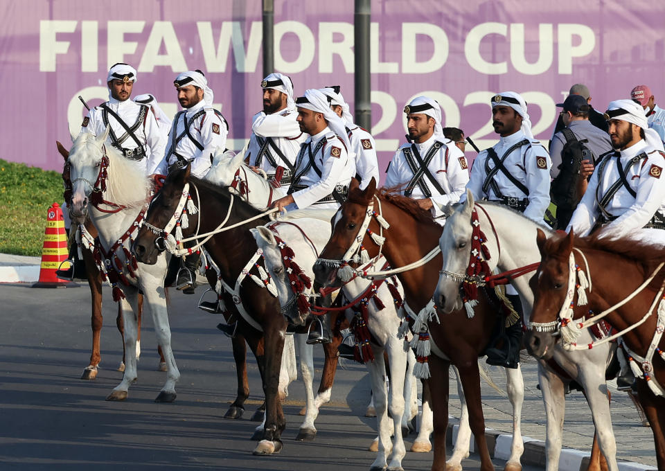 AL KHOR, QATAR - NOVEMBER 20: Members of the Amiri Guard line the main entrance to the Al Bayt stadium during the FIFA World Cup Qatar 2022 Group A match between Qatar and Ecuador at Al Bayt Stadium on November 20, 2022 in Al Khor, Qatar. (Photo by Ian MacNicol/Getty Images)