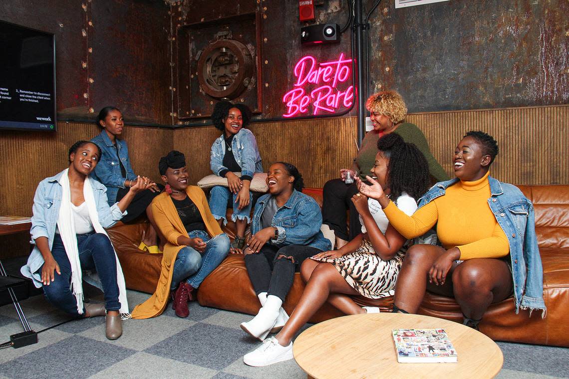 Makisha Noël (far right) talks with a group of aspiring entrepreneurs in the content creation space.