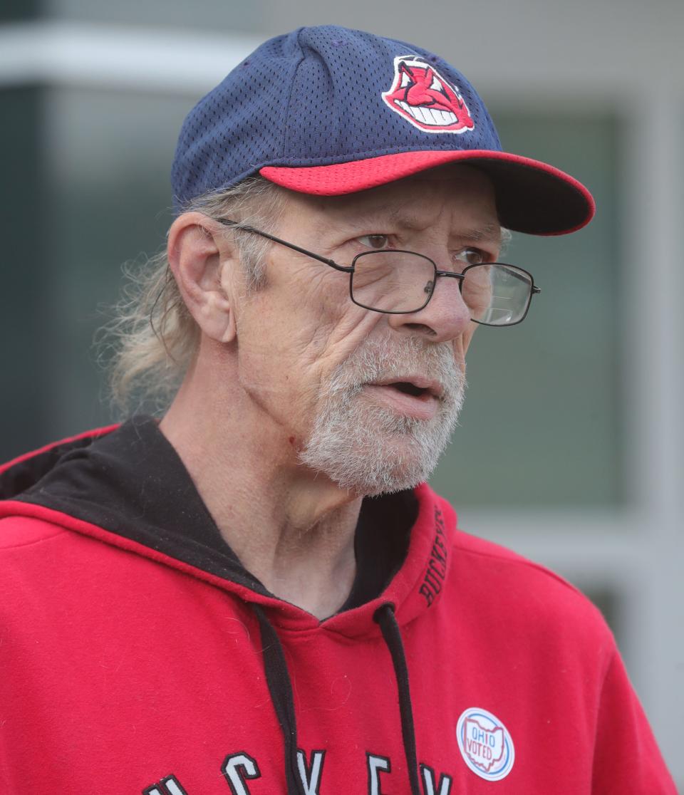 Douglas Williams talks about how he voted on Issues 1 and 2 on Tuesday, Nov. 7, 2023, in Akron, Ohio, at East CLC. [Phil Masturzo/ Beacon Journal]