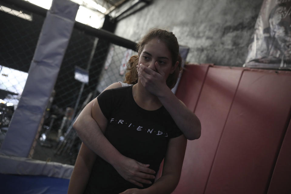 Women take free, self-defense classes from Dojo Master William H. Hessik, whose daughter Marbella Valdez Villarreal was murdered, at his Carlson Gracie Jiu-jitsu martial arts and gym in Tijuana, Mexico, Sunday, Feb. 23, 2020. When the body of law student Marbella Valdez was found at a garbage dump in Tijuana, the man who was obsessed with her demanded police solve the case, attended her funeral and a week later was arrested and charged with her murder. The man, identified by Mexican rules only by his first name, Juan, has insisted on his innocence. (AP Photo/Emilio Espejel)