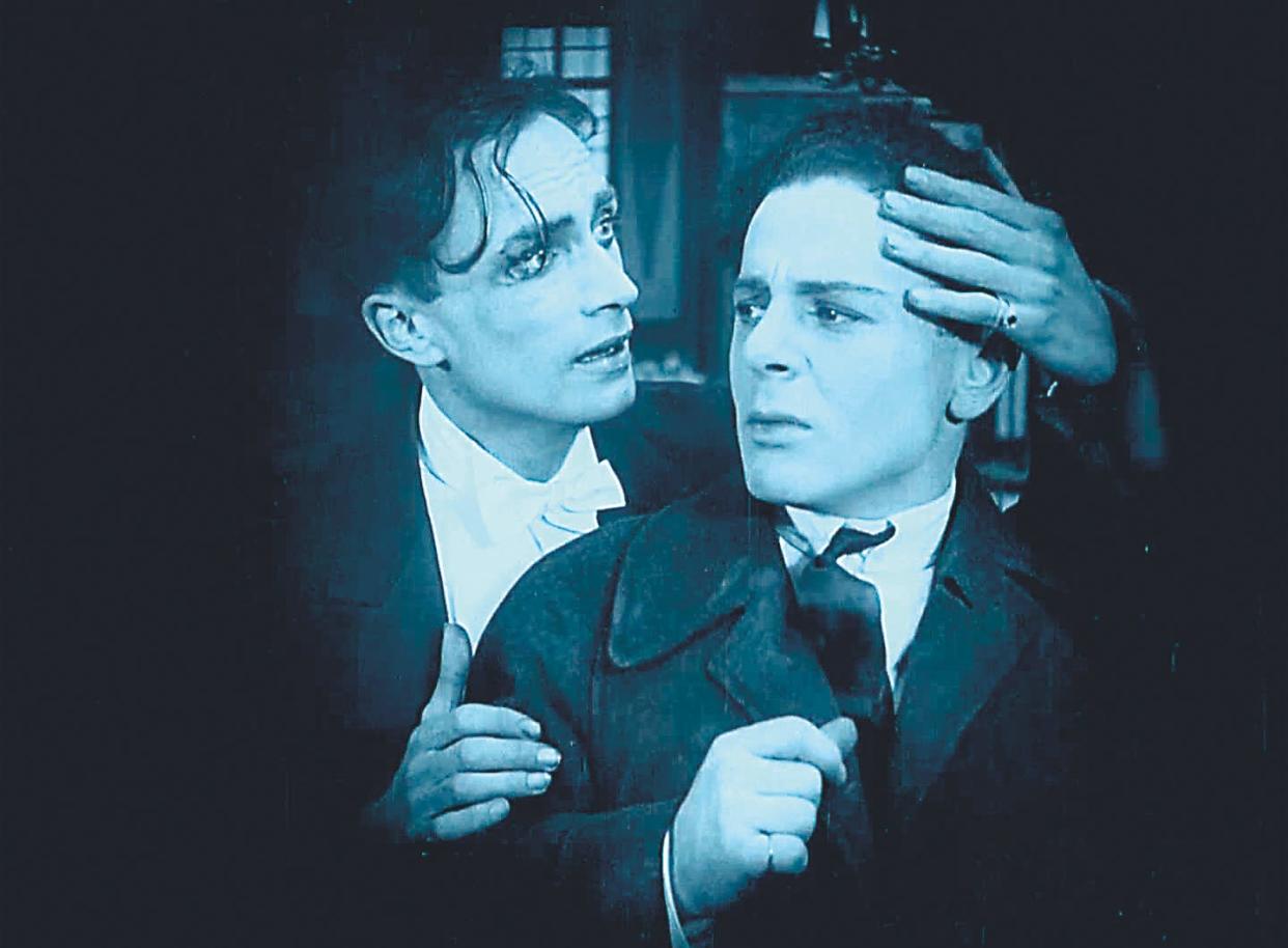 In one of the earliest queer films, protagonist Paul Körner embraces his lover after a blackmailer harasses them. <a href="https://www.edition-filmmuseum.com/shop_content.php/coID/40/product/Press-photos" rel="nofollow noopener" target="_blank" data-ylk="slk:(Edition Filmmuseum);elm:context_link;itc:0;sec:content-canvas" class="link ">(Edition Filmmuseum)</a>