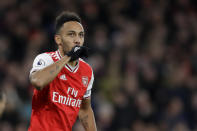 Arsenal's Pierre-Emerick Aubameyang celebrates after scoring his side's third goal during the English Premier League soccer match between Arsenal and Everton at Emirates stadium in London, Sunday, Feb. 23, 2020. (AP Photo/Kirsty Wigglesworth)