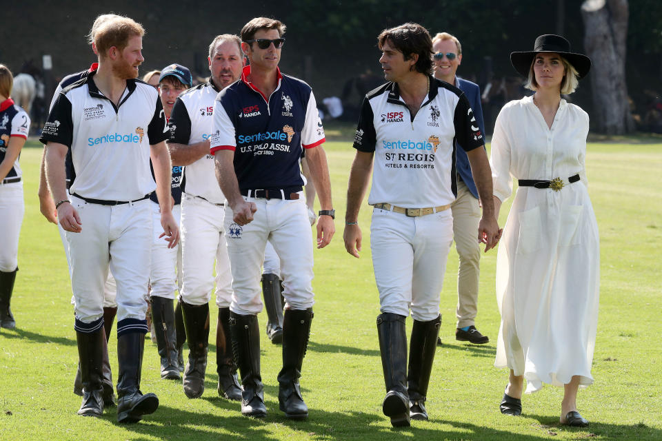 ROME, ITALY - MAY 24:   (L-R)  Harry, Duke of Sussex of Team Sentebale St Regis,  Michael Carrazza of Team Sentebale St Regis, Malcolm Borwick of  Team U.S Polo Assn and Nacho Figueras of Team Sentebale St Regis and Delphi Figueras walk to the prizegiving after the Sentebale ISPS Handa Polo Cup between Team U.S Polo Assn and Team Sentebale St Regis, at Roma Polo Club on May 24, 2019 in Rome, Italy. This is the ninth Polo Cup for Sentebale raising funds and awareness for the charity’s work supporting children and young people affected by HIV in southern Africa. (Photo by Chris Jackson/Chris Jackson/Getty Images for St Regis Hotel & Resorts)