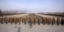 North Korean People's Army soldiers take part in a rally to swear allegiance to North Korean leader Kim Jong Un ahead of the second death anniversary of former leader Kim Jong Il at the Kumsusan Palace of the Sun, in this undated photo released by North Korea's Korean Central News Agency (KCNA) in Pyongyang December 16, 2013. (REUTERS/KCNA)