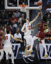 Temple's Quinton Rose (1) shoots against Belmont's Nick Muszynski (33) during the first half of a First Four game of the NCAA college basketball tournament, Tuesday, March 19, 2019, in Dayton, Ohio. (AP Photo/John Minchillo)