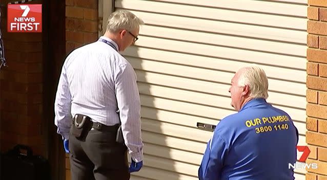 Officers were at the home with a plumber on Saturday. Photo: 7 News