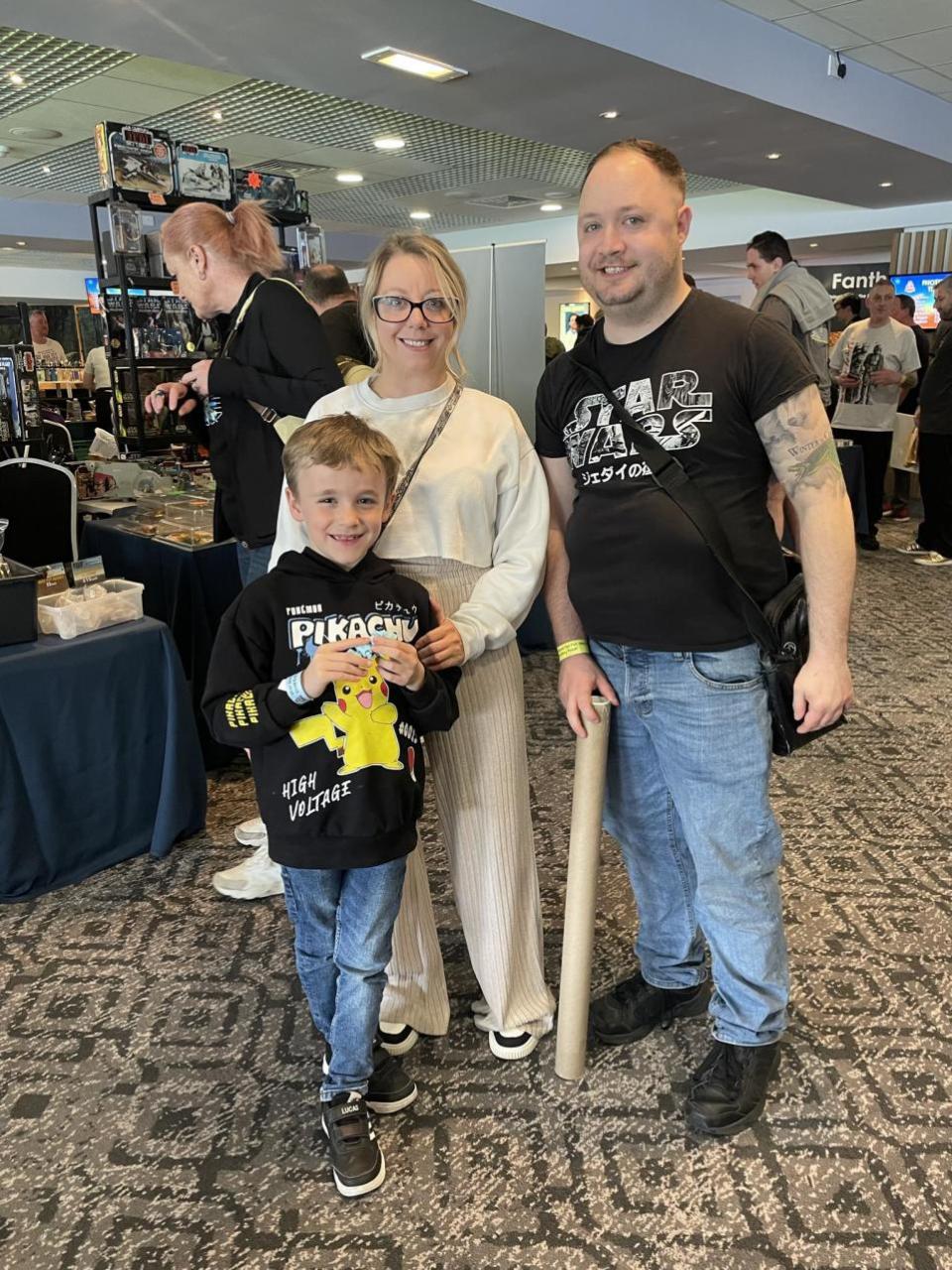 Lancashire Telegraph: Lucas Arkinstall, 7, with his aunty and uncle, Keeley and Lenny Degriffa