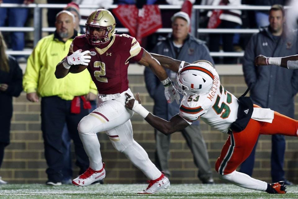 Boston College running back AJ Dillon (2) was a dark horse Heisman candidate early this season before tapering off. (AP)