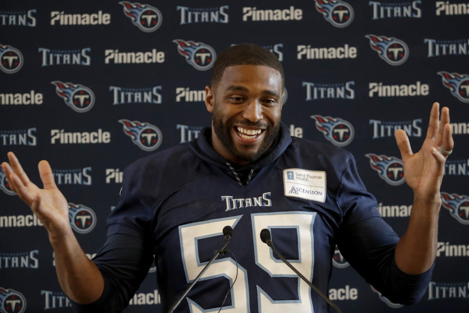 Tennessee Titans' linebacker Wesley Woodyard gives a press conference after an NFL training session at Syon House, in Syon Park, south west London, Friday, Oct. 19, 2018. The Tennessee Titans are preparing for an NFL regular season game against the Los Angeles Chargers in London on Sunday. (AP Photo/Matt Dunham)