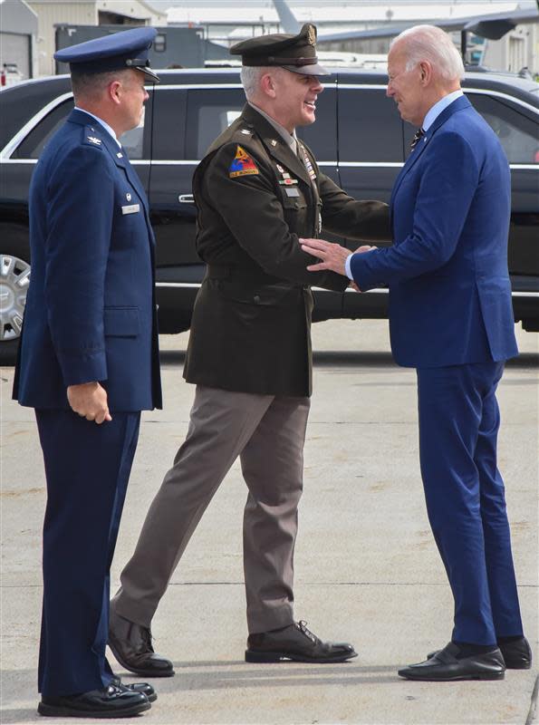 President Joe Biden is greeted by Maj. Gen. Michael Turley, Adjutant General Utah National Guard on Aug. 9, 2023 at Roland R. Wright Air National Guard base. President Biden’s visit will include his remarks on the one year anniversary of the PACT Act, which is the most significant expansion of benefits and services for toxic exposed veterans and survivors in over 30 years. (U.S. Air National Guard photo by: Tech. Sgt. Nicholas Perez)