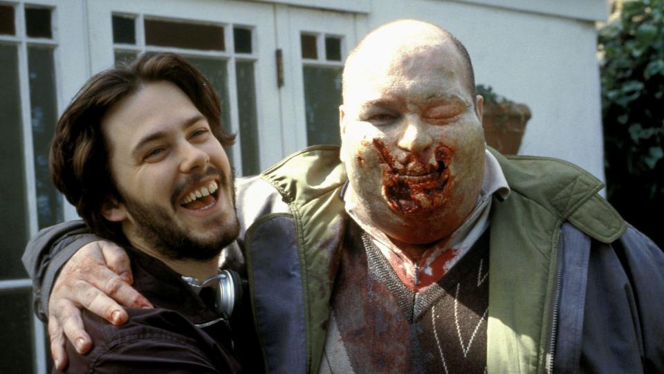 Director Edgar Wright with a zombie actor on the set of Shaun of the Dead. (Alamy)