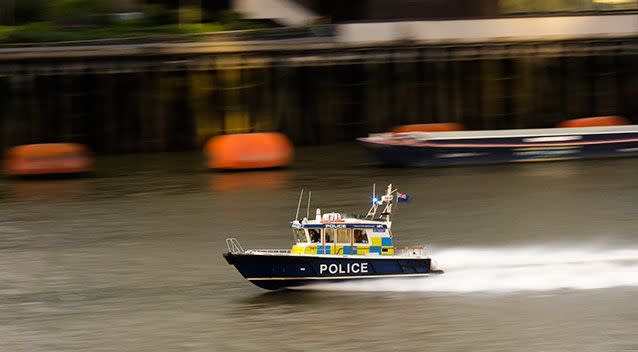 A police boat patrols at the River Thames near London Bridge. Source: AAP