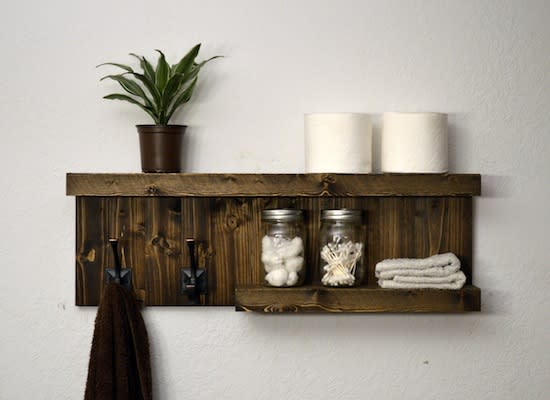 <body> <p>Adding <a rel="nofollow noopener" href=" http://www.bobvila.com/articles/diy-shelves/?bv=yahoo" target="_blank" data-ylk="slk:shelf space;elm:context_link;itc:0;sec:content-canvas" class="link ">shelf space</a> to a cramped bath is as simple as staining a precut wooden board and securing it with L-brackets above the door. Top your homemade shelf with plastic baskets filled with loose toiletries, and they’ll be free and clear of dust when you take them down!</p> <p><strong>Related: <a rel="nofollow noopener" href=" http://www.bobvila.com/slideshow/13-unusual-tips-for-your-cleanest-bathroom-ever-48495#.VrvflmTysy4?bv=yahoo" target="_blank" data-ylk="slk:13 Unusual Tips for Your Cleanest Bathroom Ever;elm:context_link;itc:0;sec:content-canvas" class="link ">13 Unusual Tips for Your Cleanest Bathroom Ever</a> </strong> </p> </body>