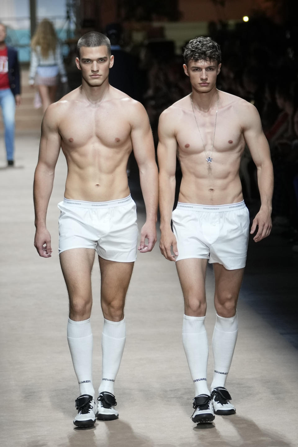 Models wear creations as part of the Dsquared2 men's Spring Summer 2024 collection presented in Milan, Italy, Friday, June 16, 2023. (AP Photo/Luca Bruno)