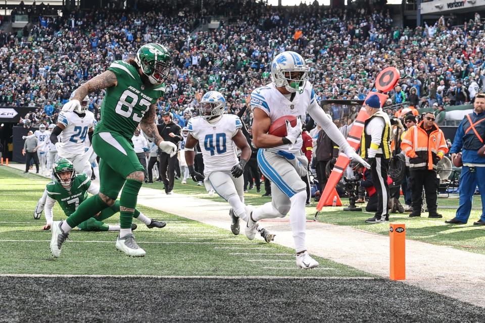 Lions wide receiver Kalif Raymond crosses into the end zone after returning a punt for a touchdown against the Jets in December.