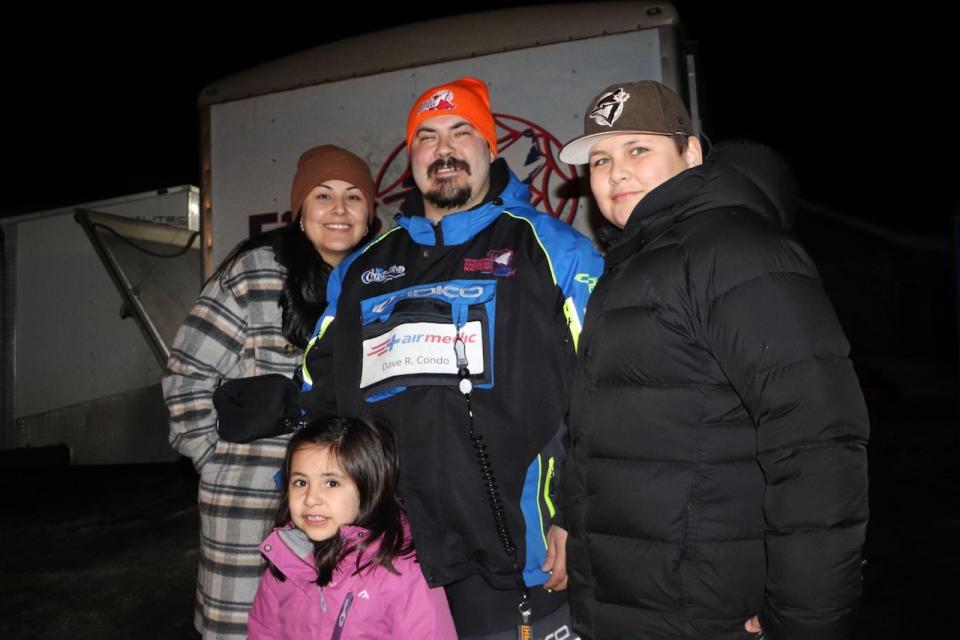 Dave Robichaud-Condo reunited with his wife and kids when he arrived by snowmobile. 